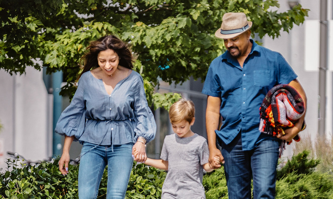 Family walking hand in hand